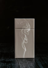 Load image into Gallery viewer, Side view of the Juniper and Mint scented matchsticks.  There is also a puff of smoke in front.
