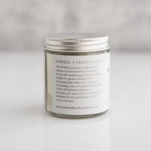 Load image into Gallery viewer, Back view of the Lunar Light candle by Emerald Hearth.  The candle has white packaging.