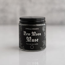 Load image into Gallery viewer, Front view of the New Moon Muse candle by Emerald Hearth.  The candle has black packaging.