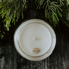 Load image into Gallery viewer, The top of an emerald hearth candle.